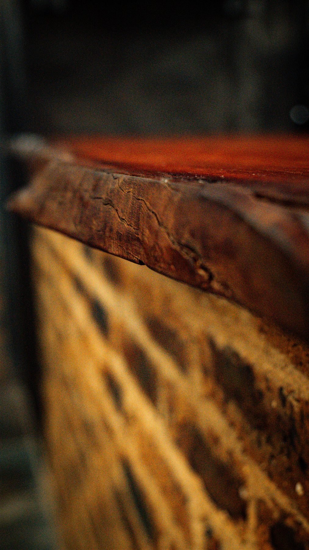 Live edge hardwood detail moody close-up custom gun room Gauteng — De Jager Wood Designs