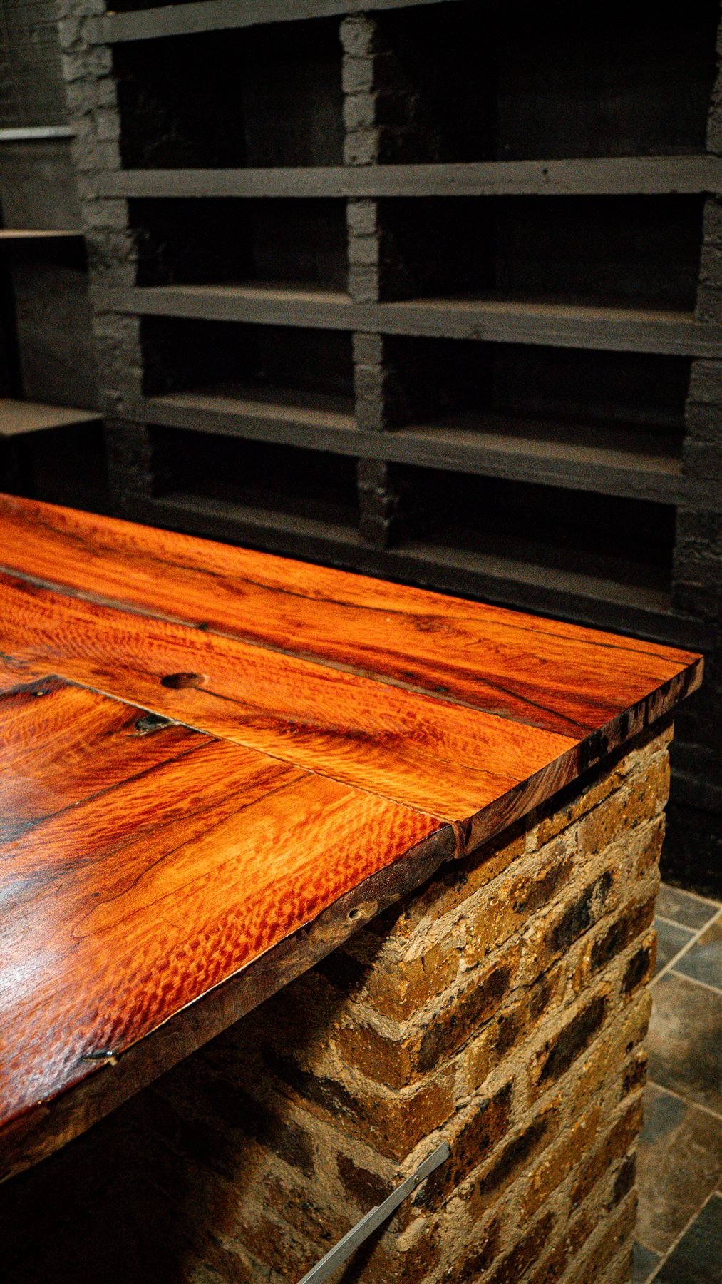 Custom bar counter hardwood gun room Gauteng moody interior — De Jager Wood Designs
